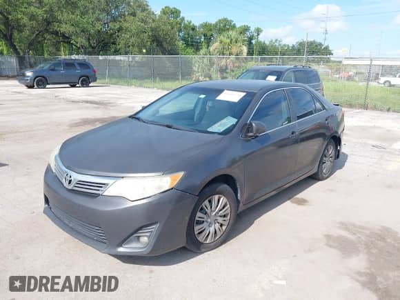 2012 Toyota Camry L z VIN 4T1BF1FK2CU579104, wystawiony jako IAAI lot #42604270 z przebiegiem 231 676 mil mil oraz . Historia ofert i sprzedaży dostępna na DreamBid. Obrazek 18.