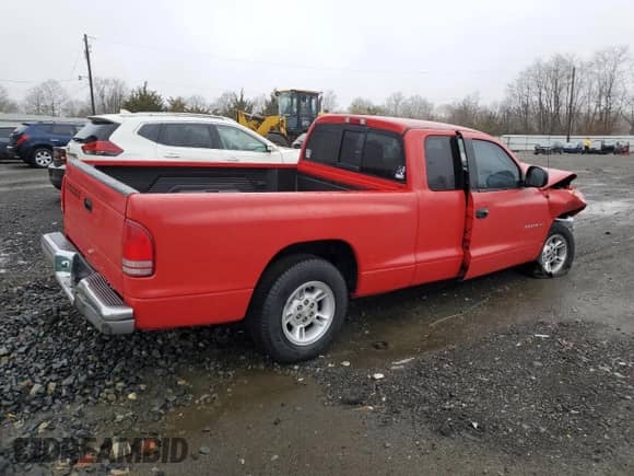2000 Dodge Dakota Sport with VIN 1B7GL22N9YS528064, listed as a Copart auction lot 48990145 with Not provided miles and Salvage title. Bid and sale history available at DreamBid. Image 3.
