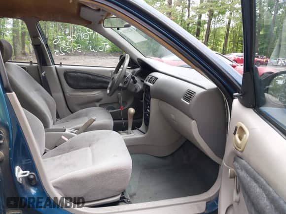 2000 Chevrolet Prizm LSi z VIN 1Y1SK5289YZ401584, wystawiony jako IAAI lot #42263210 z przebiegiem 151 567 mil mil oraz . Historia ofert i sprzedaży dostępna na DreamBid. Obrazek 5.