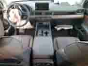 2025 Honda Pilot Elite with VIN 5FNYG1H81SB020096, listed as a Copart auction lot 70533595 with 12,951 mi miles and Salvage title. Bid and sale history available at DreamBid. Image 8.