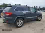 2012 Jeep Grand Cherokee Limited z VIN 1C4RJFBG8CC300891, wystawiony jako Copart lot #84041155 z przebiegiem 141 239 mil mil oraz Czysty tytuł • Clean title. Historia ofert i sprzedaży dostępna na DreamBid. Obrazek 3.