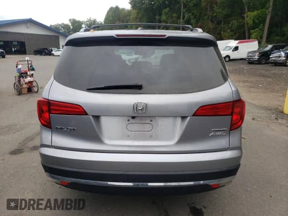 2016 Honda Pilot Touring with VIN 5FNYF6H94GB095794, listed as a Copart auction lot 72895044 with 102,246 mi miles and Salvage title. Bid and sale history available at DreamBid. Image 6.