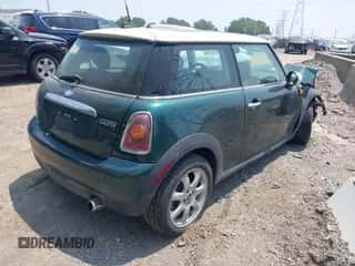 2009 MINI Hardtop with VIN WMWMF33549TU71313, listed as a IAAI auction lot 42483891 with 122,577 mi miles and . Bid and sale history available at DreamBid. Image 4.