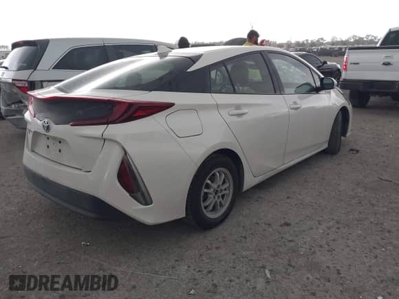 2018 Toyota Prius Plus z VIN JTDKARFP0J3084142, wystawiony jako IAAI lot #41936736 z przebiegiem 50 699 mil mil oraz . Historia ofert i sprzedaży dostępna na DreamBid. Obrazek 4.