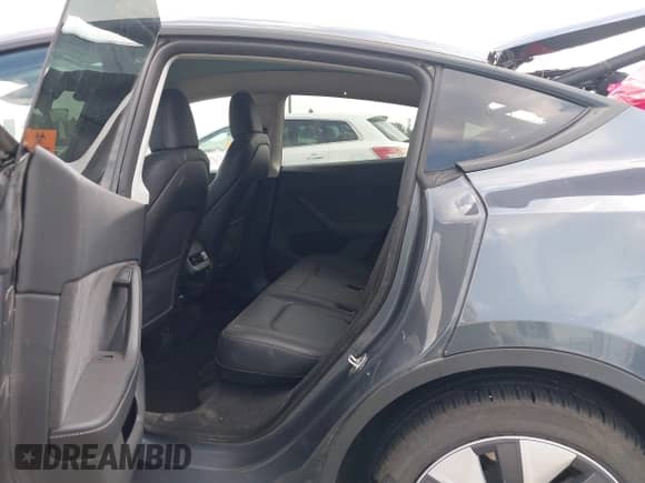 2023 Tesla Model Y Long Range z VIN 7SAYGDEE5PA208753, wystawiony jako IAAI lot #43211154 z przebiegiem 40 499 mil mil oraz . Historia ofert i sprzedaży dostępna na DreamBid. Obrazek 8.