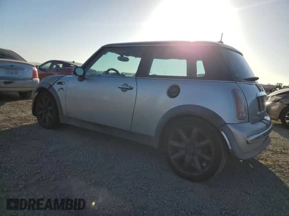 2004 MINI Hardtop with VIN WMWRC33494TC54180, listed as a Copart auction lot 87096995 with 160,028 mi miles and Salvage title. Bid and sale history available at DreamBid. Image 2.