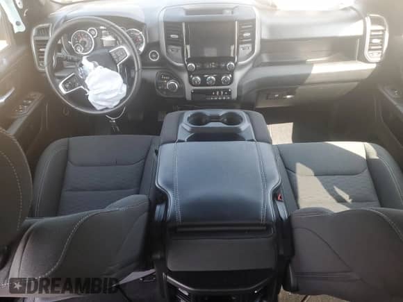 2025 Ram 1500 Tradesman with VIN 1C6RRFGG0SN646400, listed as a Copart auction lot 65794815 with 9,838 mi miles and Salvage title. Bid and sale history available at DreamBid. Image 8.