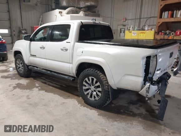 2021 Toyota Tacoma Limited with VIN 3TYGZ5AN6MT029957, listed as a IAAI auction lot 41517557 with 55,673 mi miles and . Bid and sale history available at DreamBid. Image 3.