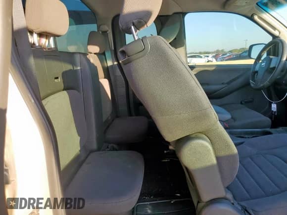 2010 Nissan Frontier SE with VIN 1N6BD0CTXAC413611, listed as a Copart auction lot 82269845 with 211,108 mi miles and Salvage title. Bid and sale history available at DreamBid. Image 10.