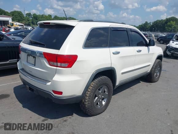2012 Jeep Grand Cherokee Overland z VIN 1C4RJFCT1CC171419, wystawiony jako IAAI lot #42824161 z przebiegiem 172 345 mil mil oraz . Historia ofert i sprzedaży dostępna na DreamBid. Obrazek 4.