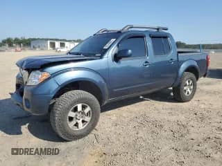 2013 Nissan Frontier Pro-4X with VIN 1N6AD0EV6DN746150, listed as a Copart auction lot 80648885 with 201,724 mi miles and Clean title. Bid and sale history available at DreamBid. Image 1.