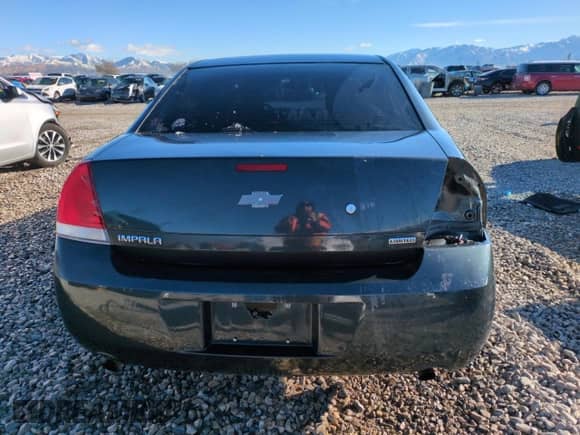 2014 Chevrolet Impala Police Police with VIN 2G1WD5E36E1166204, listed as a Copart auction lot 86559504 with 202,242 mi miles and Salvage title. Bid and sale history available at DreamBid. Image 6.
