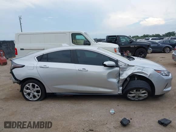 2016 Chevrolet Volt Premier z VIN 1G1RD6S50GU127155, wystawiony jako IAAI lot #42979778 z przebiegiem 133 688 mil mil oraz . Historia ofert i sprzedaży dostępna na DreamBid. Obrazek 13.