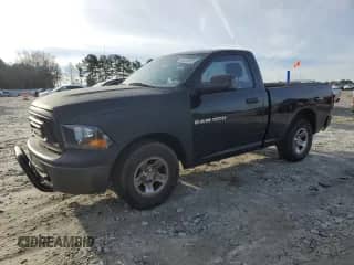 2012 Ram 1500 ST with VIN 3C6JD6AK1CG185811, listed as a Copart auction lot 88538965 with 211,560 mi miles and Salvage title. Bid and sale history available at DreamBid. Image 1.