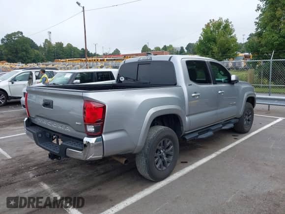 2021 Toyota Tacoma SR5 with VIN 5TFAZ5CN4MX110609, listed as a IAAI auction lot 43172655 with 36,100 mi miles and . Bid and sale history available at DreamBid. Image 4.