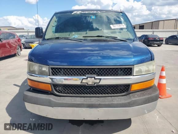 2004 Chevrolet Express Passenger with VIN 1GBFG15T041233492, listed as a Copart auction lot 82193815 with 219,338 mi miles and Salvage title. Bid and sale history available at DreamBid. Image 5.