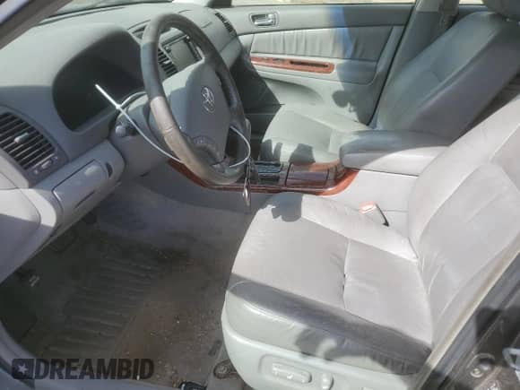 2005 Toyota Camry LE with VIN JTDBF30K750162421, listed as a Copart auction lot 70646615 with 204,702 mi miles and Salvage title. Bid and sale history available at DreamBid. Image 7.