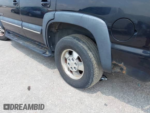 2002 Chevrolet Tahoe Z71 z VIN 1GNEK13Z72R226297, wystawiony jako IAAI lot #42812667 z przebiegiem 329 117 mil mil oraz . Historia ofert i sprzedaży dostępna na DreamBid. Obrazek 6.