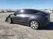 2024 Tesla Model Y Long Range with VIN 7SAYGDEE6RF054205, listed as a Copart auction lot 85551495 with 21,837 mi miles and Salvage title. Bid and sale history available at DreamBid. Image 2.