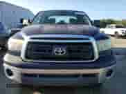2012 Toyota Tundra с VIN 5TFRM5F1XCX040803, выставлен на аукционе Copart как лот 82314415 с пробегом 223 115 миль миль и Чистый • Clean title. История ставок и продаж доступна на DreamBid. Изображение 5.