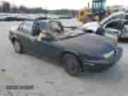 1999 Saturn SL with VIN 1G8ZJ5276XZ106206, listed as a Copart auction lot 75212184 with Not provided miles and Salvage title. Bid and sale history available at DreamBid. Image 4.