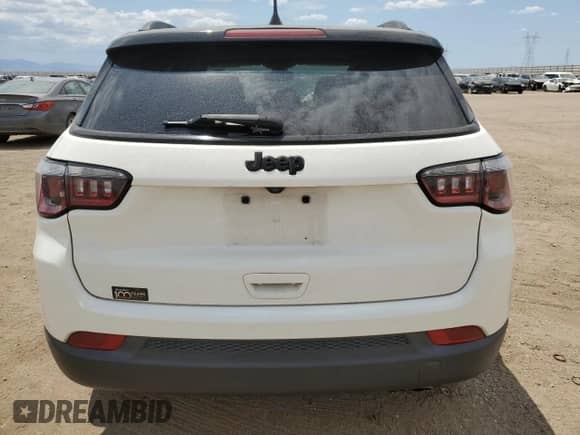 2018 Jeep Compass Latitude z VIN 3C4NJCBB2JT318340, wystawiony jako Copart lot #65468945 z przebiegiem 68 133 mil mil oraz Szkoda całkowita • Salvage title. Historia ofert i sprzedaży dostępna na DreamBid. Obrazek 6.