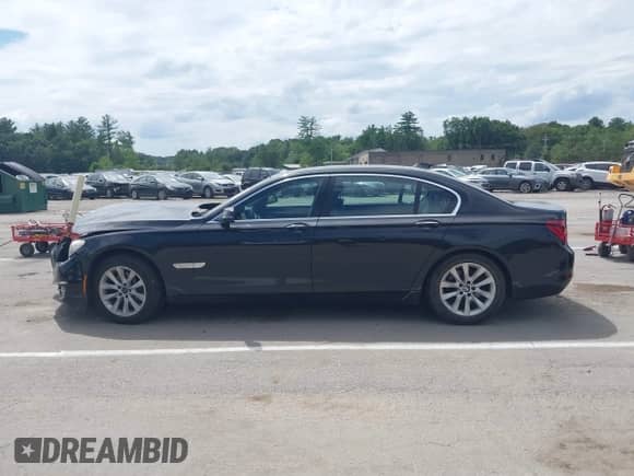 2013 BMW 7 Series 740Li xDrive with VIN WBAYF4C58DDE23696, listed as a IAAI auction lot 42623950 with 144,247 mi miles and . Bid and sale history available at DreamBid. Image 14.
