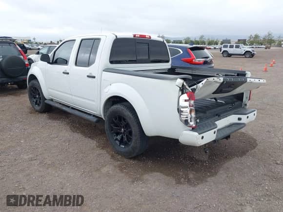 2021 Nissan Frontier SV with VIN 1N6ED0EA3MN706638, listed as a IAAI auction lot 42207448 with 74,115 mi miles and . Bid and sale history available at DreamBid. Image 3.