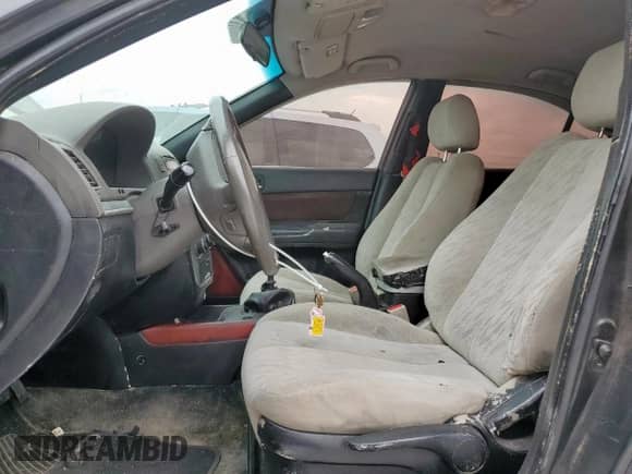 2006 Hyundai Sonata GL z VIN KMHET46C66A114122, wystawiony jako Copart lot #67100165 z przebiegiem 193 918 mil mil oraz Szkoda całkowita • Salvage title. Historia ofert i sprzedaży dostępna na DreamBid. Obrazek 7.