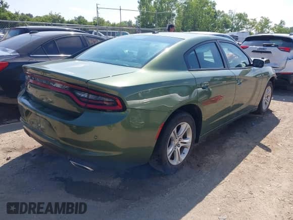 2022 Dodge Charger SXT with VIN 2C3CDXBG4NH197346, listed as a IAAI auction lot 42932630 with 51,412 mi miles and . Bid and sale history available at DreamBid. Image 4.