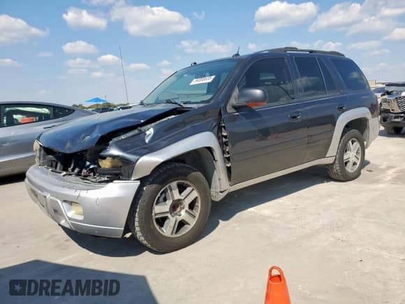 2005 Chevrolet TrailBlazer LT с VIN 1GNDS13SX52325420, выставлен на аукционе Copart как лот 84888635 с пробегом 189 711 миль миль и Списание • Salvage title. История ставок и продаж доступна на DreamBid. Изображение 1.