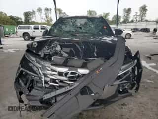 2024 Hyundai Santa Cruz SEL с VIN 5NTJC4DE9RH112614, выставлен на аукционе Copart как лот 71353384 с пробегом 1 938 миль миль и Списание • Salvage title. История ставок и продаж доступна на DreamBid. Изображение 5.