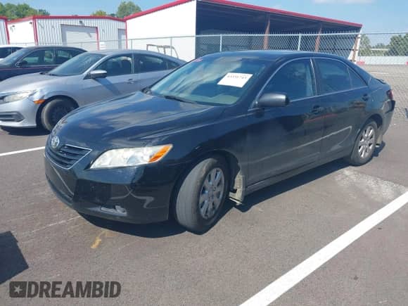 2007 Toyota Camry LE with VIN 4T1BK46K47U037277, listed as a IAAI auction lot 43351743 with 238,174 mi miles and . Bid and sale history available at DreamBid. Image 2.