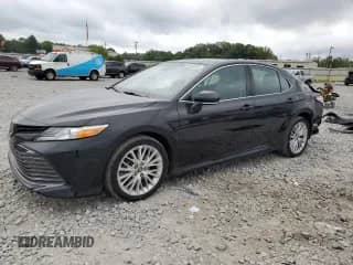 2020 Toyota Camry XLE с VIN 4T1F11AK2LU884447, выставлен на аукционе Copart как лот 68265095 с пробегом 33 211 миль миль и Списание • Salvage title. История ставок и продаж доступна на DreamBid. Изображение 1.