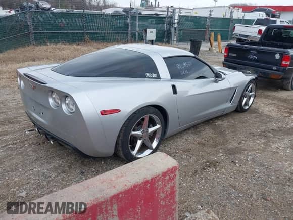 2011 Chevrolet Corvette 1LT with VIN 1G1YA2DW2B5102229, listed as a IAAI auction lot 41668527 with 65,299 mi miles and . Bid and sale history available at DreamBid. Image 4.