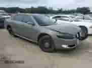 2012 Chevrolet Impala Police Police with VIN 2G1WD5E3XC1162170, listed as a Copart auction lot 70986324 with 148,208 mi miles and Salvage title. Bid and sale history available at DreamBid. Image 4.