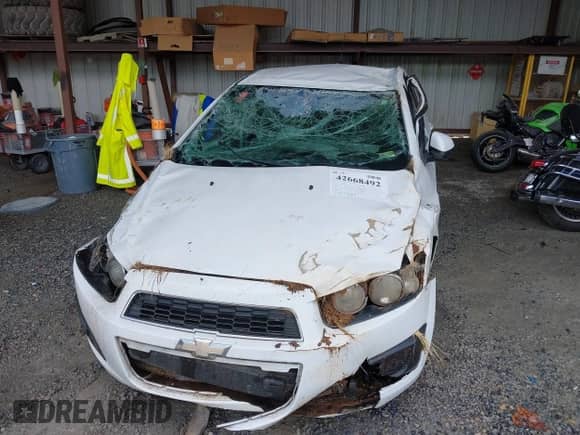 2015 Chevrolet Sonic LS с VIN 1G1JA5SH3F4128681, выставлен на аукционе IAAI как лот 42668492 с пробегом 127 966 миль миль и . История ставок и продаж доступна на DreamBid. Изображение 6.