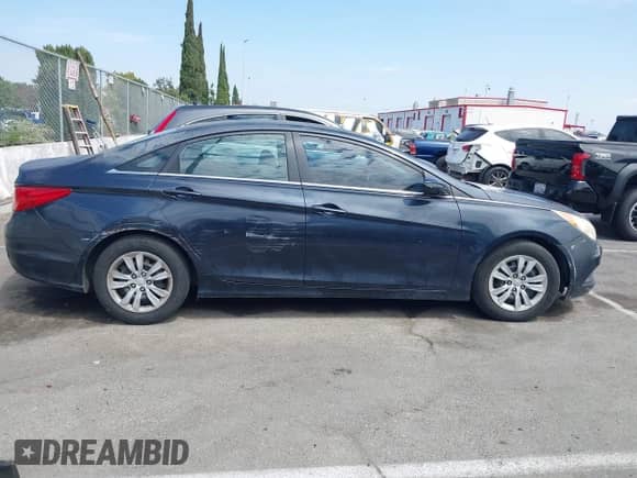 2011 Hyundai Sonata GLS z VIN 5NPEB4AC8BH151190, wystawiony jako IAAI lot #43024466 z przebiegiem 102 082 mil mil oraz . Historia ofert i sprzedaży dostępna na DreamBid. Obrazek 13.