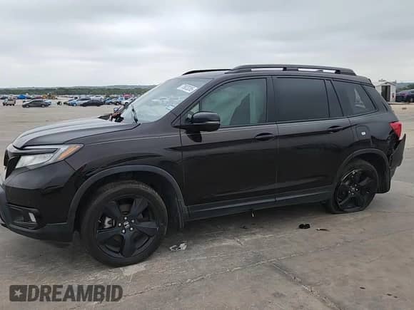 2019 Honda Passport Elite with VIN 5FNYF8H05KB016655, listed as a Copart auction lot 70923285 with Not provided miles and Salvage title. Bid and sale history available at DreamBid. Image 13.