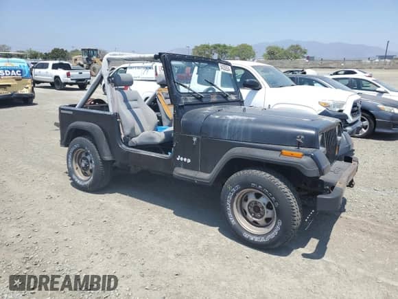 1990 Jeep Wrangler с VIN 2J4FY29T8LJ541585, выставлен на аукционе Copart как лот 54352634 с пробегом 138 022 миль миль и Списание • Salvage title. История ставок и продаж доступна на DreamBid. Изображение 4.