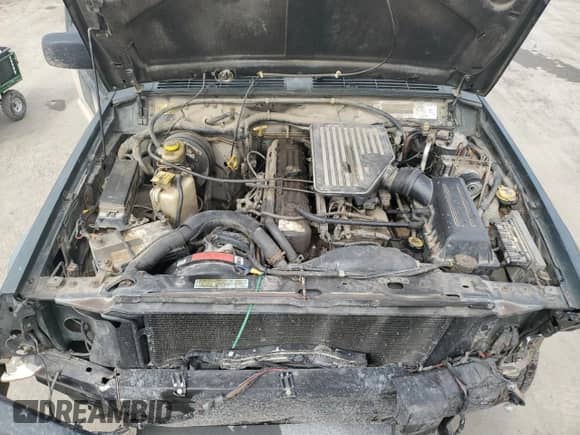 1997 Jeep Grand Cherokee with VIN 1J4FN68S3VL523954, listed as a Copart auction lot 49080415 with 196,082 mi miles and Salvage title. Bid and sale history available at DreamBid. Image 13.