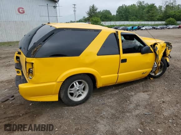 2003 Chevrolet Blazer LS z VIN 1GNCS18X43K116185, wystawiony jako Copart lot #56846644 z przebiegiem Nie podano mil oraz Czysty tytuł • Clean title. Historia ofert i sprzedaży dostępna na DreamBid. Obrazek 3.