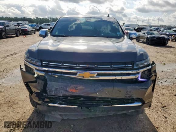 2021 Chevrolet Tahoe Premier with VIN 1GNSKSKD0MR119755, listed as a Copart auction lot 62820075 with 100,446 mi miles and Clean title. Bid and sale history available at DreamBid. Image 5.