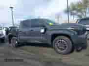 2024 Toyota Tacoma SR5 with VIN 3TMLB5JN5RM051339, listed as a IAAI auction lot 41241754 with 7,181 mi miles and . Bid and sale history available at DreamBid. Image 6.