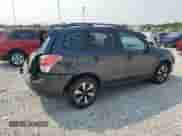 2018 Subaru Forester Premium z VIN JF2SJAGC9JH605358, wystawiony jako Copart lot #71279215 z przebiegiem 131 554 mil mil oraz Szkoda całkowita • Salvage title. Historia ofert i sprzedaży dostępna na DreamBid. Obrazek 3.