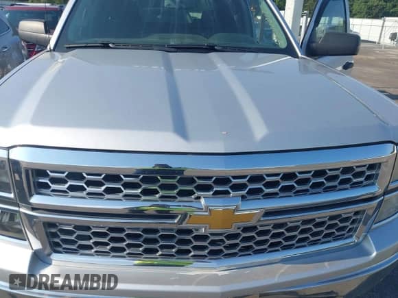 2014 Chevrolet Silverado 1500 LT with VIN 3GCPCREHXEG259073, listed as a IAAI auction lot 43010013 with 128,000 mi miles and . Bid and sale history available at DreamBid. Image 6.