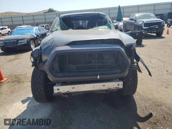 2020 Toyota Tacoma SR5 with VIN 3TMCZ5AN6LM306812, listed as a Copart auction lot 67223955 with 90,130 mi miles and Salvage title. Bid and sale history available at DreamBid. Image 5.