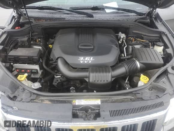 2012 Jeep Grand Cherokee Limited z VIN 1C4RJFBG2CC187150, wystawiony jako Copart lot #84956805 z przebiegiem 136 040 mil mil oraz Szkoda całkowita • Salvage title. Historia ofert i sprzedaży dostępna na DreamBid. Obrazek 11.