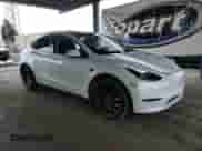 2022 Tesla Model Y Performance с VIN 7SAYGDEF0NF487098, выставлен на аукционе Copart как лот 80744715 с пробегом 39 557 миль миль и Списание • Salvage title. История ставок и продаж доступна на DreamBid. Изображение 4.