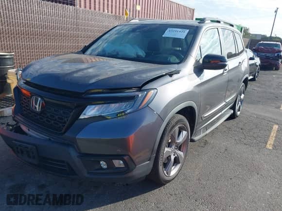 2019 Honda Passport Touring with VIN 5FNYF7H90KB006205, listed as a IAAI auction lot 43291429 with Not provided miles and . Bid and sale history available at DreamBid. Image 2.